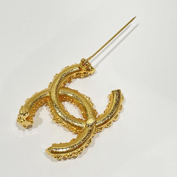 Coco Chanel Pin Brooch in Gilt Metal CC Logo Pearl and Strass at